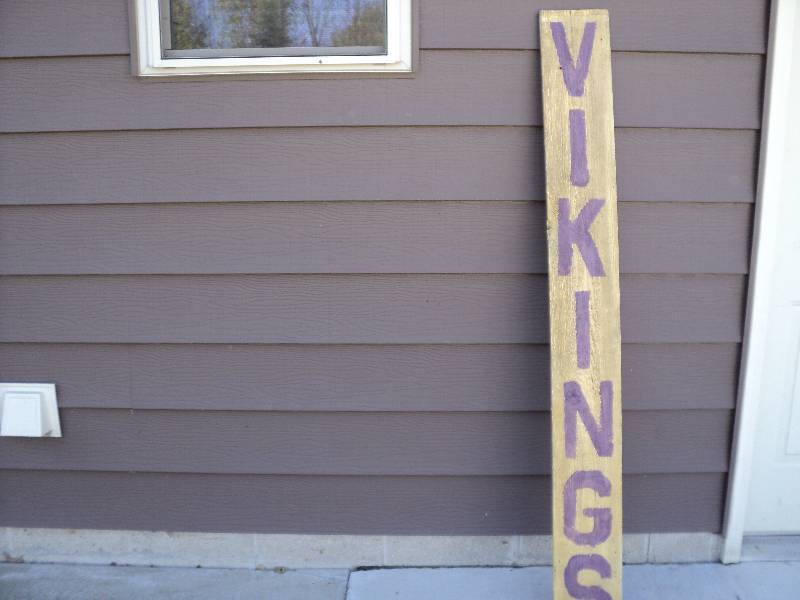 lot 27 image: vikings sign on wood, 6ft tall...