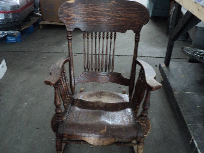 lot 66 image: wood rocking chair...