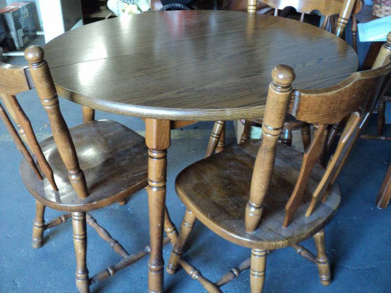 lot 98 image: 41 in diameter round table and 3 ch...