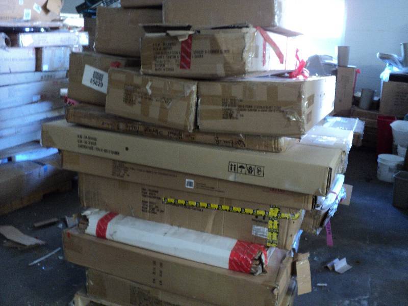 lot 106 image: pallet of overstock furniture stack...