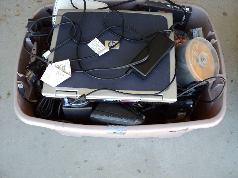 lot 115 image: tote of cards and laptop- powers on...