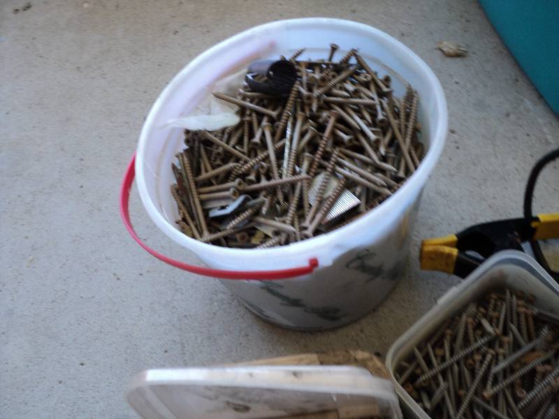 lot 117 image: tote full of exterior screws and mu...