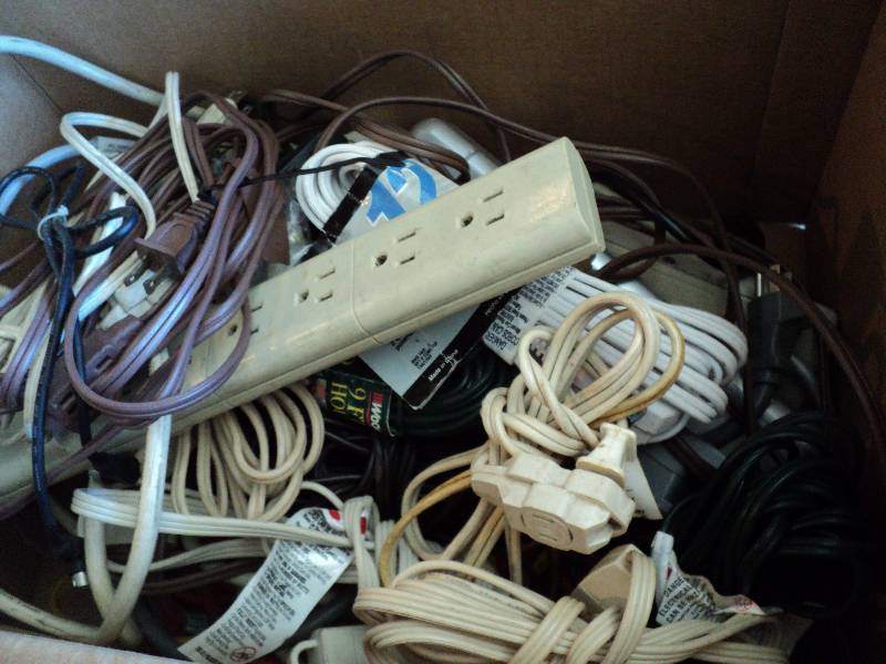 lot 122 image: box of extenstion cords...