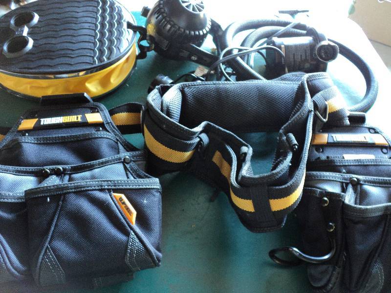 lot 142 image: tool belt and pumps...
