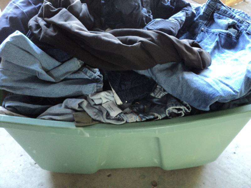 lot 151 image: tub with cover full of mens jeans...