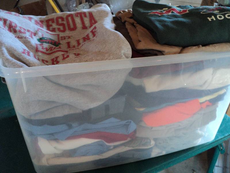 lot 179 image: covered tote full of mens wild swea...