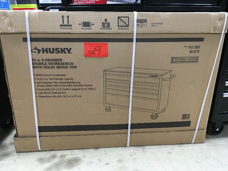 lot 29 image: Husky 46 in. 9-Drawer Mobile Workbench with Solid Wood Top, Black not used