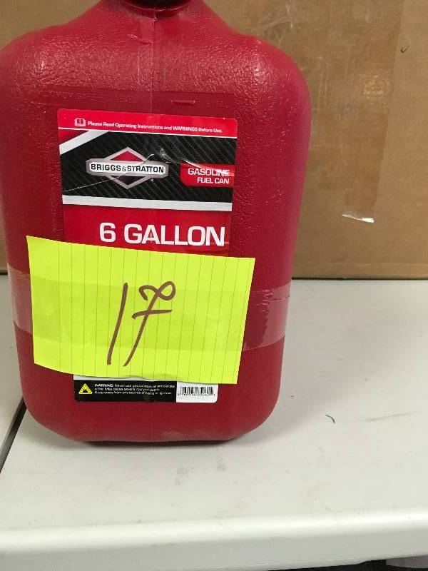lot 17 image: Briggs and Stratton 6 Gallon Gasoline container never used