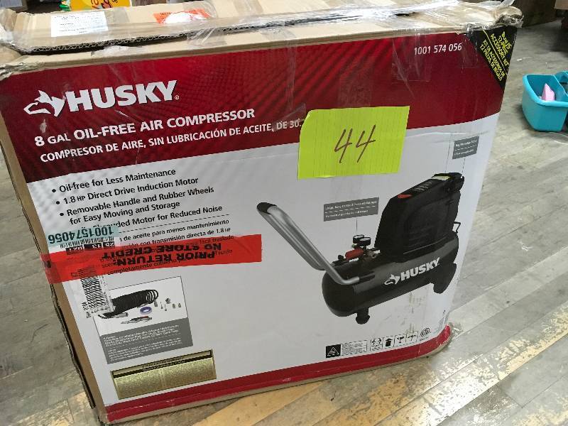 lot 44 image: Husky 8 Gallon Portable Oil Free Electric Air Compressor, Open Package not used