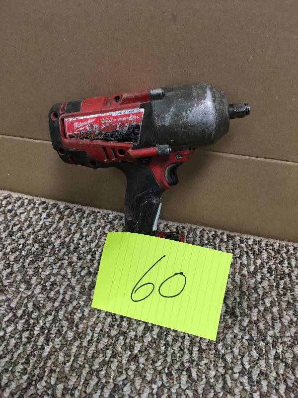 lot 60 image: USED Milwaukee M18 18-Volt Lithium-Ion Brushless 12 in. Cordless High Torque Impact Wrench with Friction Ring. USED Tool Only in good working condition