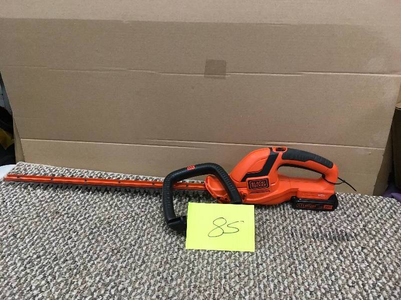 lot 85 image: USED - Black & Decker LHT2220 20-Volt MAX Cordless Lithium-Ion 22 in. Dual Action Electric Hedge Trimmer. USED in good working condition