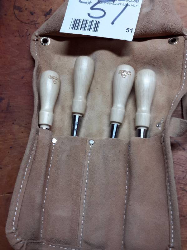 lot 51 image: Set of 4 Stanley Wood chisels and deer hide sheath