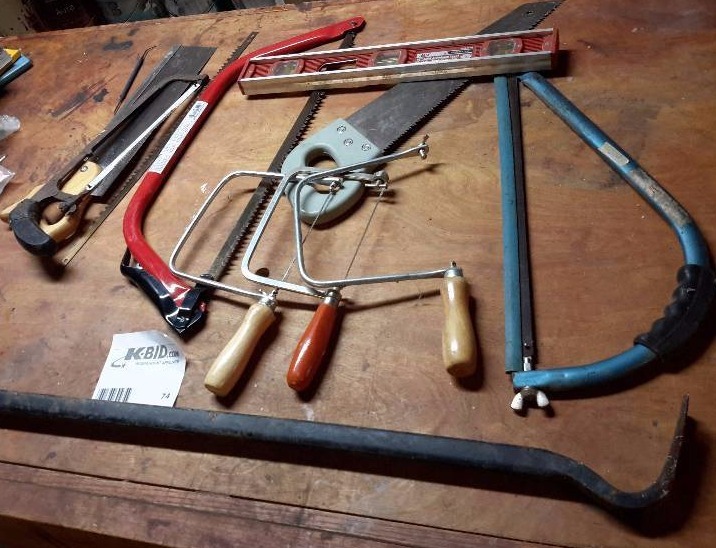 lot 74 image: Misc. Saws  Wrecking bar  18in level