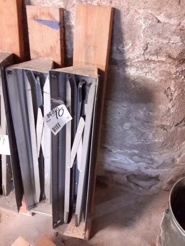 lot 10 image: 2 metal folding saw horses