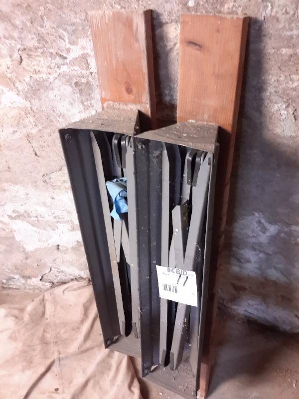 lot 11 image: 2 metal folding saw horses