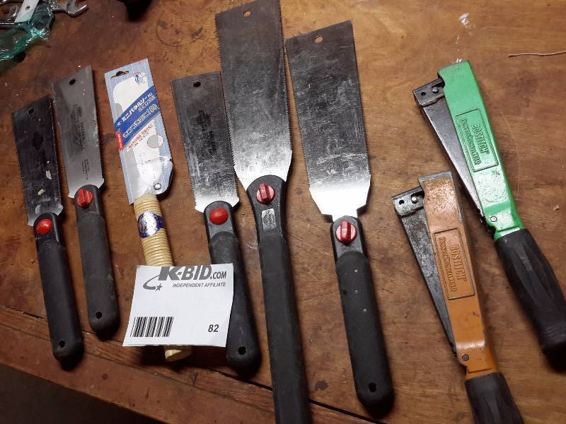 lot 82 image: 6 pull saws for fine cutting.. 2 Bostitch staplers