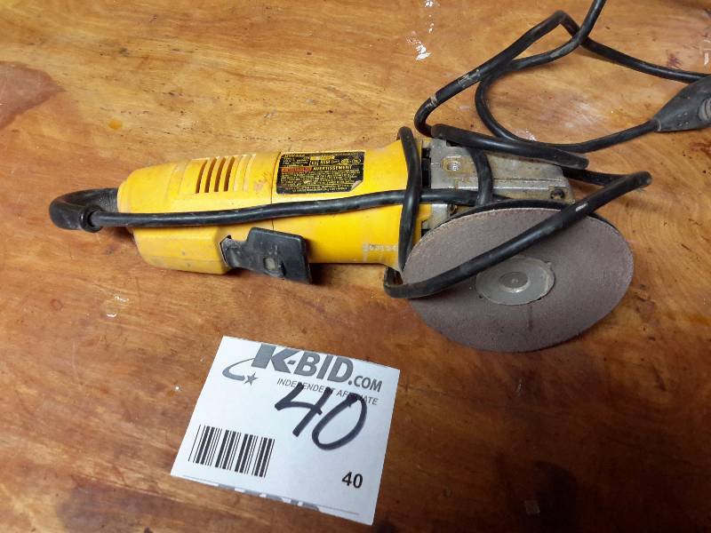 lot 40 image: Dewalt, 4 12 in Angle Grinder