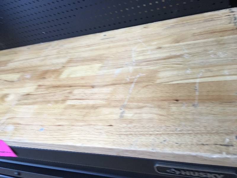 Husky 60.125 in. 10-Drawer and 1-Door 24 in. D Textured Black Matte Mobile Workbench, Sliding Pegboard and Shelf scratched on top and some scratches present on unit