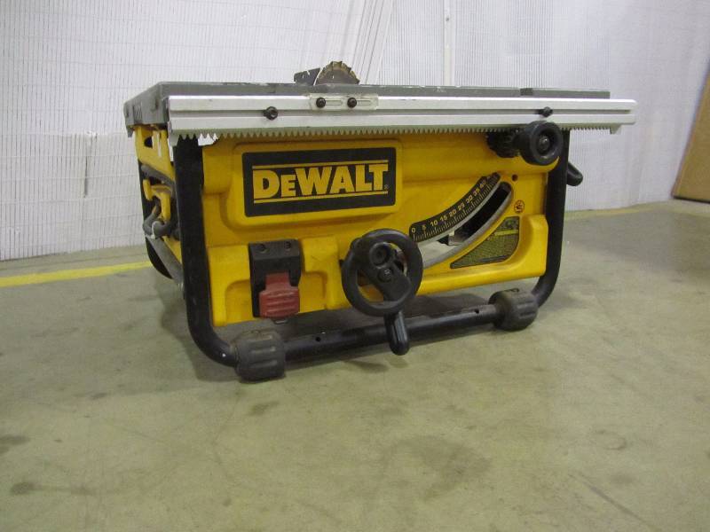 lot 12 image: DEWALT 15 Amp 10 in. Compact Job Site Table Saw