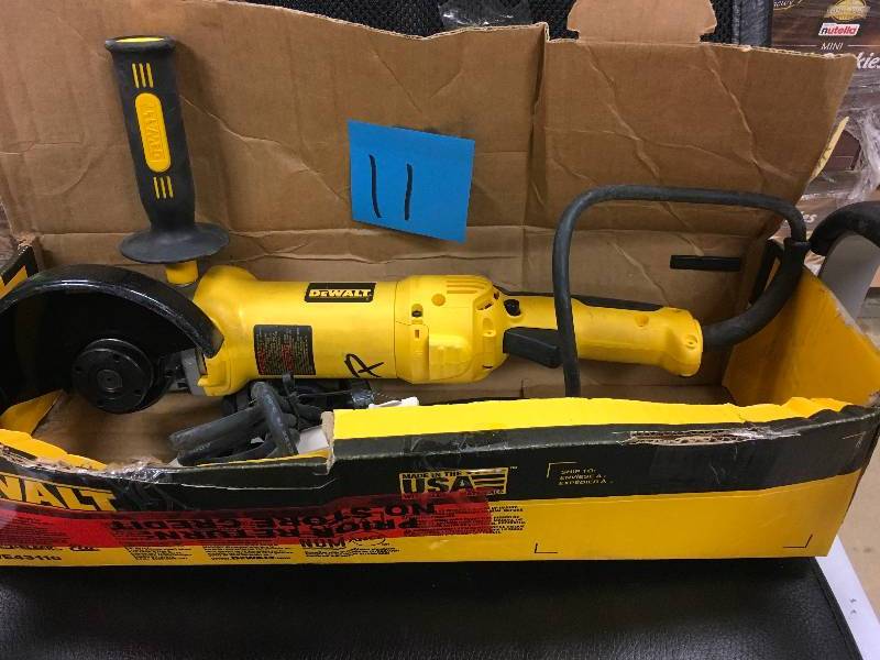 lot 11 image: DeWalt 13 Amp Corded 4-12 in. Angle Grinder.  Open Box never used