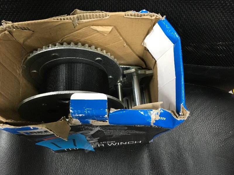 lot 17 image: Reese Towpower #1500 Winch with Strap and Hook.  Open Box