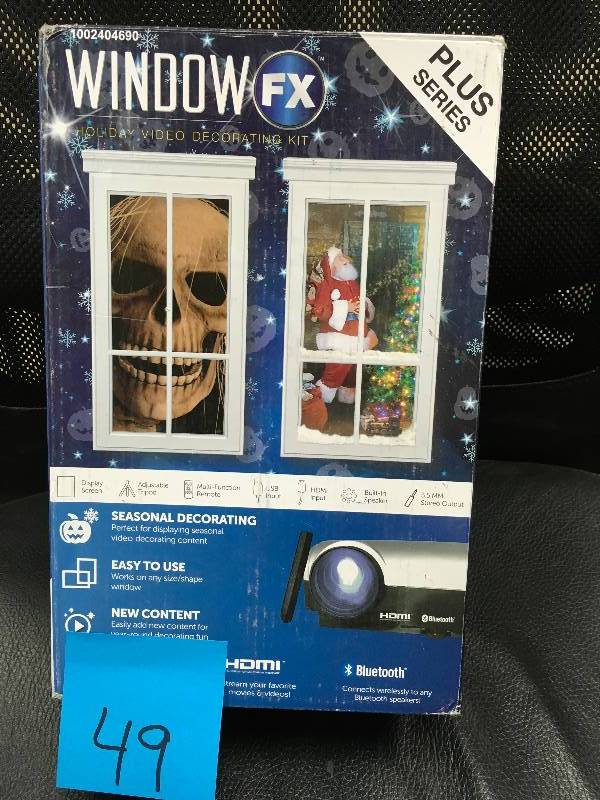 lot 49 image: Window FX Holiday Video Decorating Kit. Open box never used