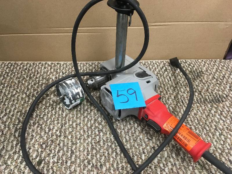 lot 59 image: Milwauwkee 12 in Right Angle Drill. Used