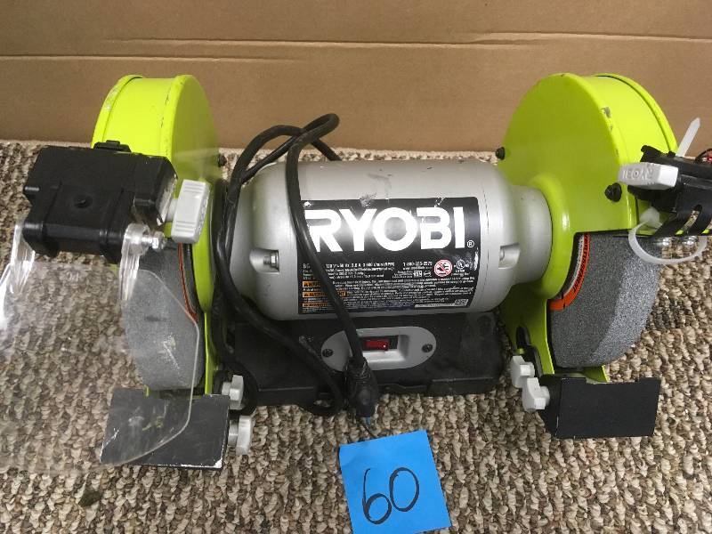 lot 60 image: Ryobi 8 in Bench Grinder. New light damage missing face guard.