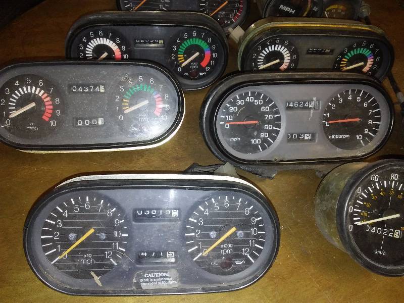 lot 33 image: Tach and Speedometer misc. and parts