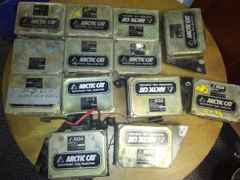 lot 35 image: Arctic Cat EFI boxes (13) see pictures for part numbers