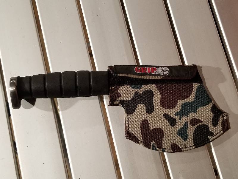 lot 47 image: GRIP Hatchet with Camo Sheath