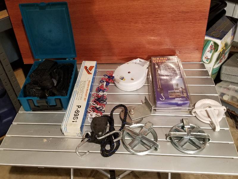 lot 104 image: Lot- Hang Em High Hoist, Roller Bracket Set, Etc