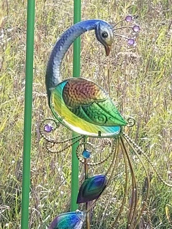 lot 172 image: Lot - Green Shepherd Hooks & Colorful Peacock Stake