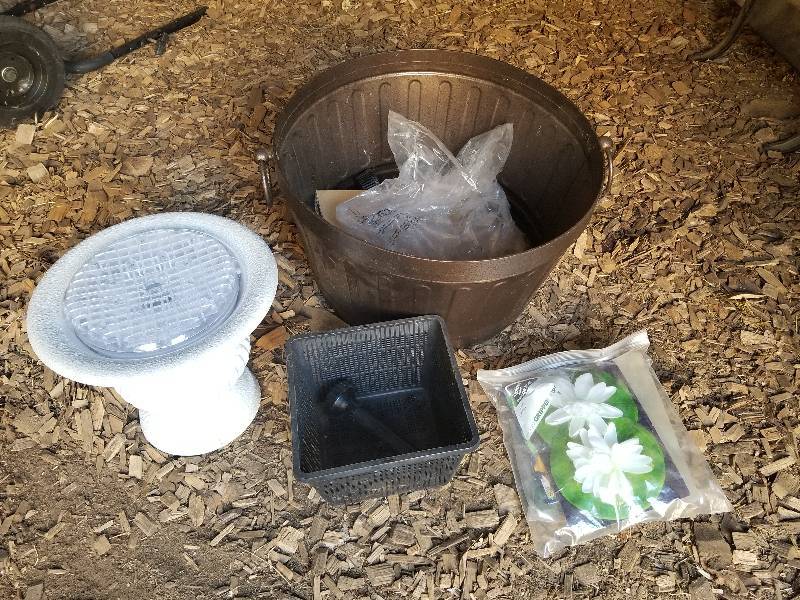 lot 195 image: Pond Fountain & Misc Pond Accessories, Planter