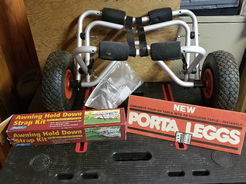 lot 304 image: Lot - CanoeKayak Carrier Cart, Awning Strap Down Kit, Porta Legs