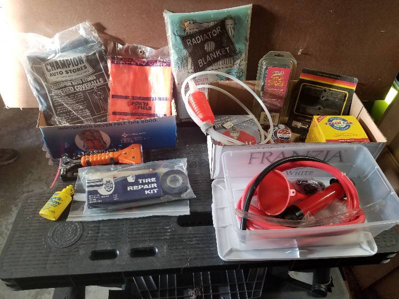 lot 342 image: Lot - Misc Auto Items - Gas Syphon Kit, Multi Function Auto Tool (Window Breaker, etc), Coveralls, Etc