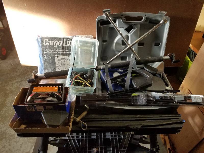 lot 343 image: Lot - Misc Auto Items - Tire Iron, Cargo Liner, Windshield Wipes, Extension Mirrors, Wash System, Etc