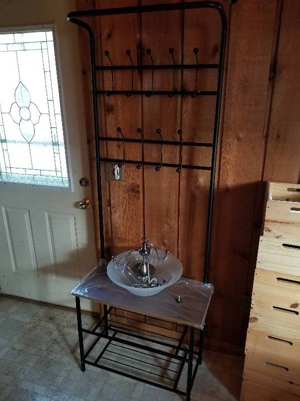 lot 397 image: Hall TreeCoat Rack 74x26x13, and New Progess Lighting Hanging Light