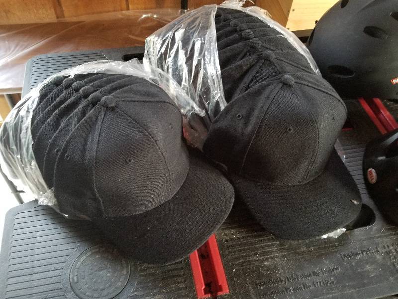 lot 404 image: Lot - Bicycle Helmets and Black Hats