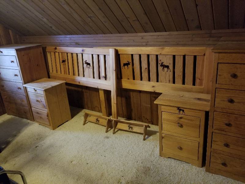 lot 455 image: Moose Themed Wood Bedroom Set.  (2) Dressers 49x31x20, (2) Nightstands 27x21x16, (2) Headboards 47h x 64w. Also 2 wood shelves