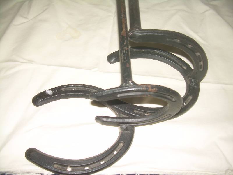 2 VINTAGE IRON HANGERS