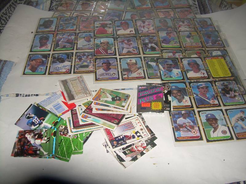 MULTIPLE PAGES OF SPORTS CARDS