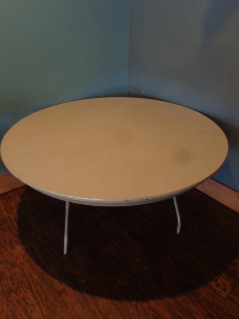 lot 57 image: Round Banquet Table