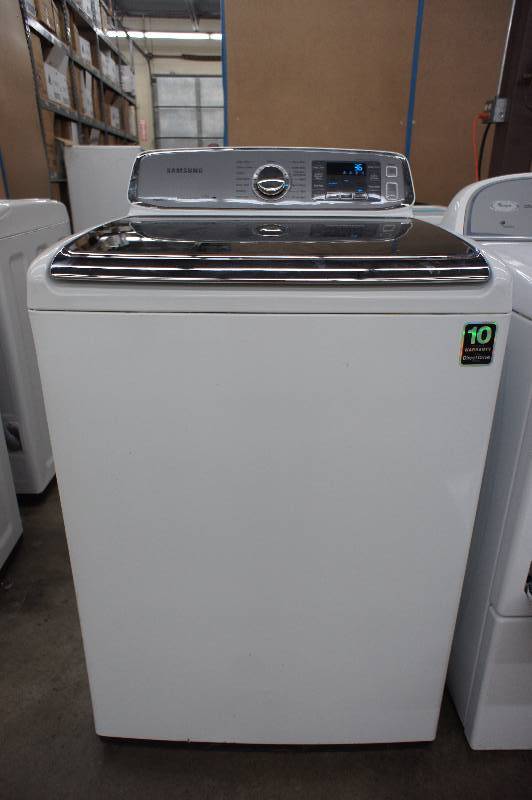 lot 14 image: PREVIOUSLY OWNED - Scratch and Dent - Samsung Model # ( WA50M7450AW) Top-Loading Washer - 4 cu ft - White Color -    Tested Works - MSRP $ 999.99