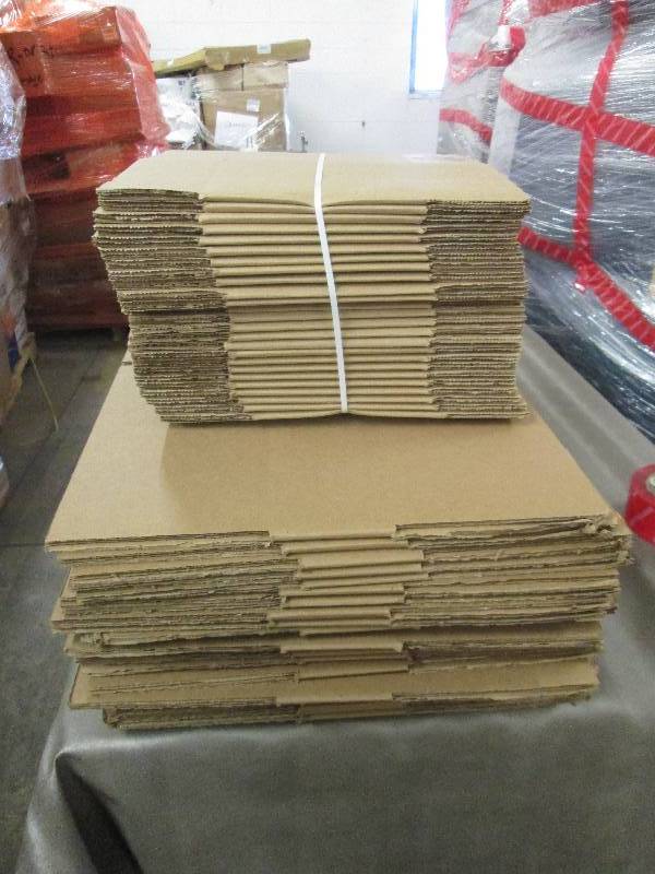 Stack of 2 Sizes Cardboard Boxes...