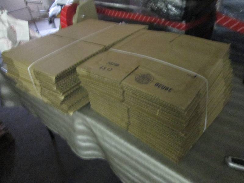 Stack of 2 Sizes Cardboard Boxes...