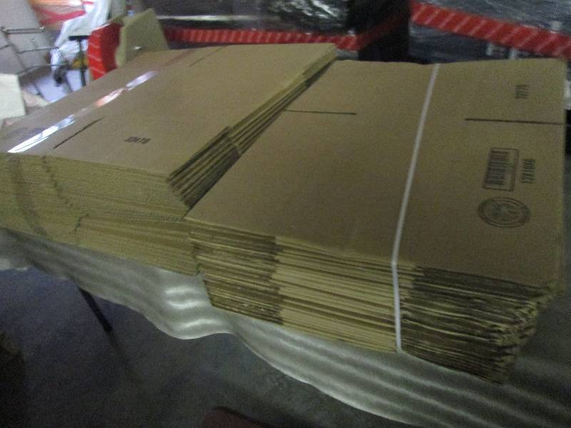 Stack of 2 Sizes Cardboard Boxes...