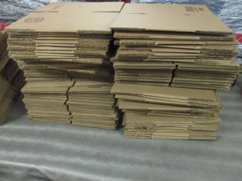 Stack of Small Cardboard Boxes...