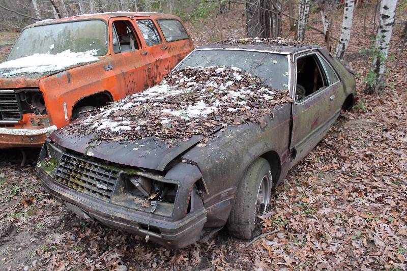 lot 58 image: 1970s Ford Two Door coupe and extra Tires