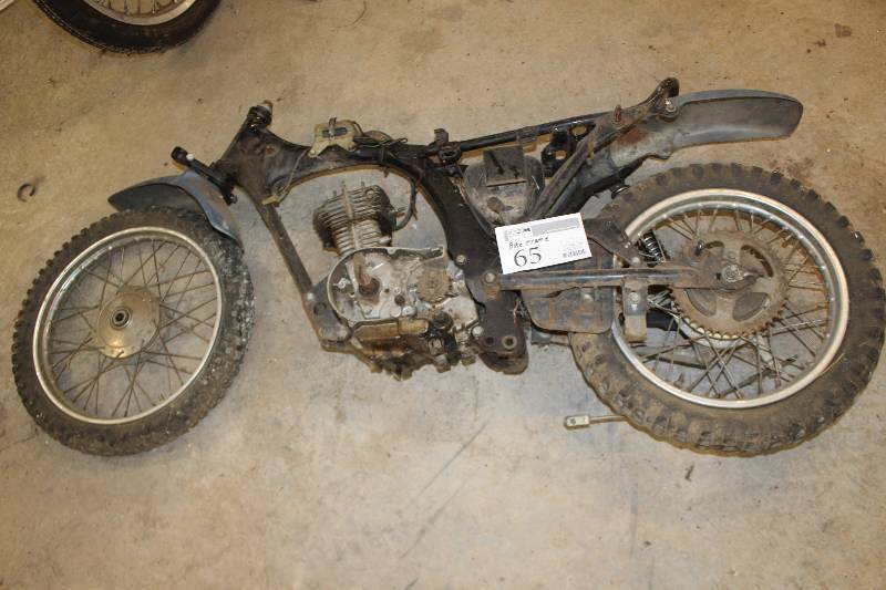lot 65 image: Motorcycle Frame w Partial Motor, Wheels, Tires